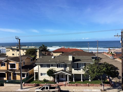 view from rooftop deck- one block to the beach, pier to the left