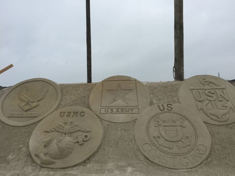 Sandfest scupture honoring the 5 U.S. Services!