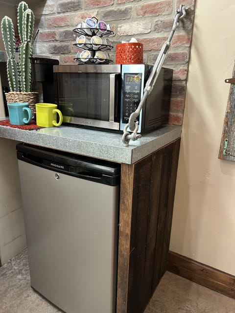 Keurig coffee maker, mini fridge, microware, bagel toaster. We furnish
coffees.