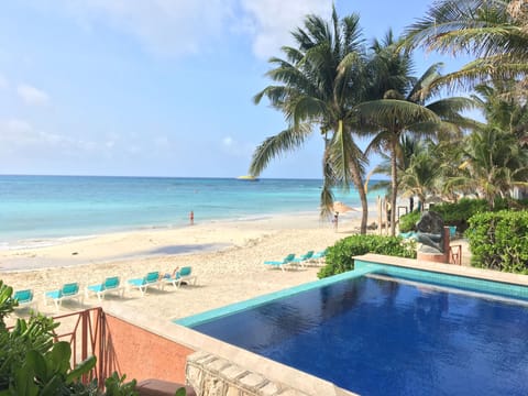 On the beach, sun loungers, beach towels