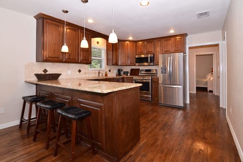 Beautiful view of the kitchen that includes all your cooking necessities.