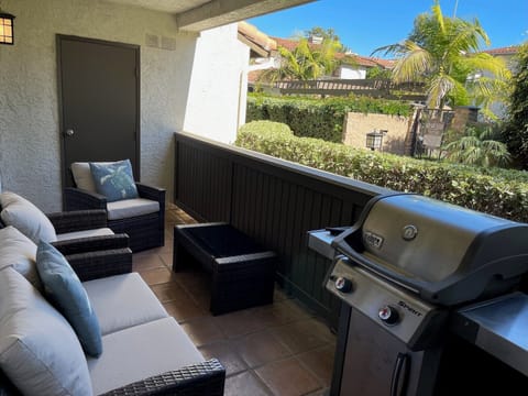 Large patio overlooking garden and pool - Webber grill and new patio furniture