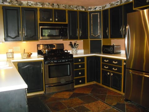  Kitchen has everything you need, gas stove,large refrigerator, Keurig coffee pot,