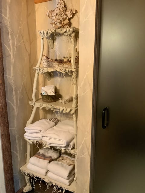 Custom-made towel rack in the loft bathroom