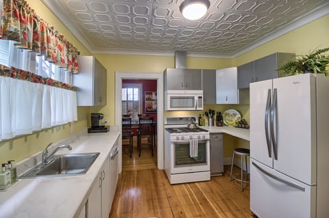 Prepare a healthy home cooked meal in the well stocked kitchen.