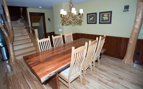 massive wooden dining table, seating for 10 people