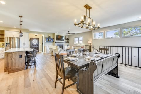 Dining table expands to seat 8-9 with 4 more at the island counter.  6 outside!!