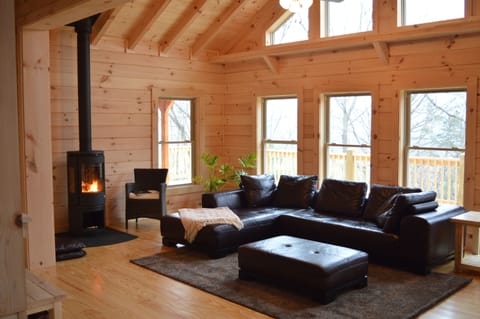 Living Room with Danish Wood Burning Stove and Leather Sofa