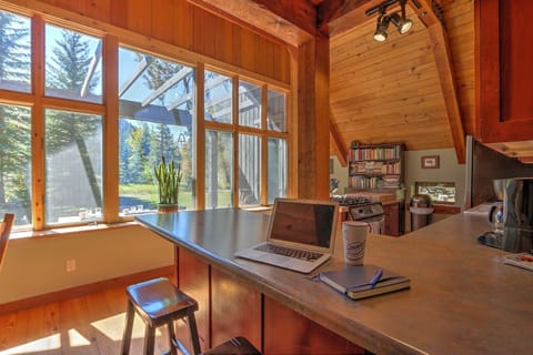 Spacious, well-equipped kitchen with breakfast bar seating 