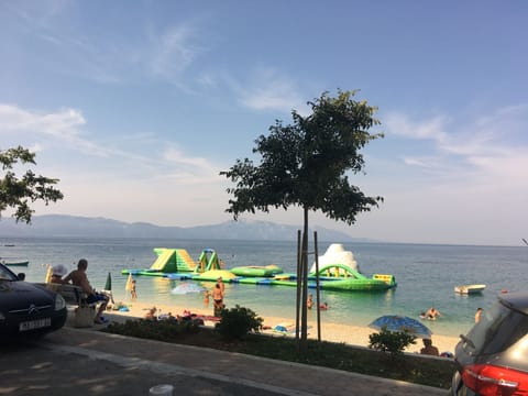 On the beach, sun loungers, beach towels