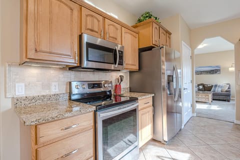Cook with ease in this fully equipped kitchen, complete with modern appliances and ample counter space