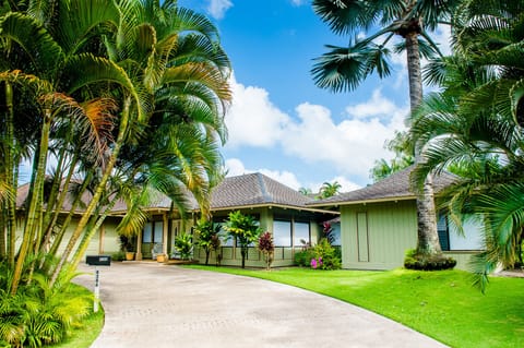 Beautiful Hawaiian Style Home surrounded by tropical gardens!