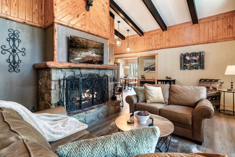 Living Room with sofa, loveseat, pub table for 2 and comfy chair