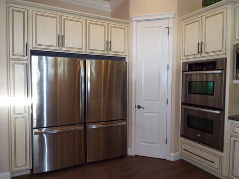 Kitchen refridgerator- Double side by side stainless steel units- 
Double Ovens!