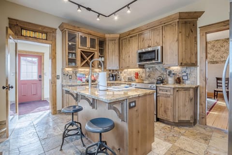"Gather, cook, and connect in this inviting kitchen and dining space, designed for effortless meals and good conversation.