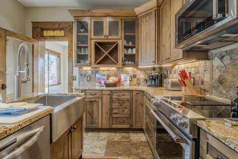 Fully equipped kitchen with modern appliances—cook up a feast after a day of exploring Colorado’s outdoor wonders!