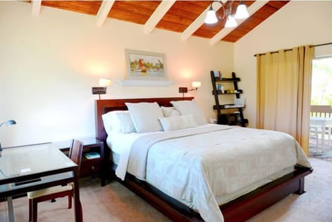 King size bed with luxurious pillows and bedding. 