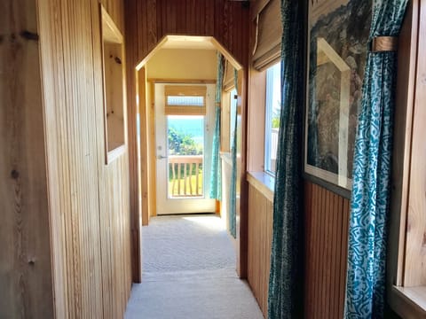 Hallway and entrance to apartment...looking West toward Ocean