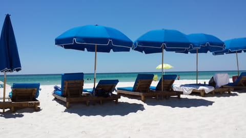 On the beach, sun loungers