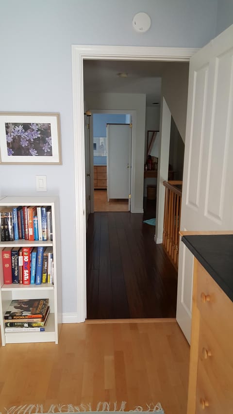 View from back bedroom facing other bedroom. Full bath in hall between these two