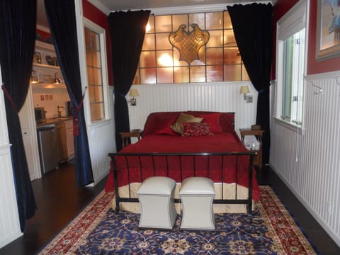 Queen sized bed with both feather and foam pillows, fireplace, tv, stereo, etc.