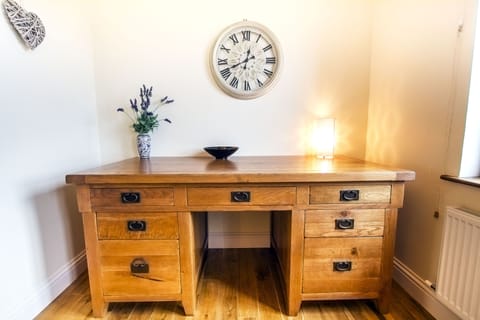 Queen bedroom next to a main bathroom. Overlooking garden. Mountain views.