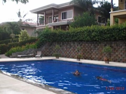 Steps from the Villa is the shared saltwater pool (24X48 meters) 3 to 6 feet. .