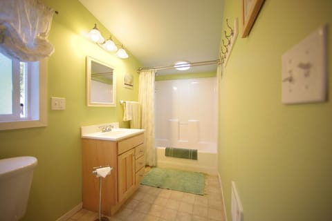 Combined shower/tub, hair dryer, towels, soap