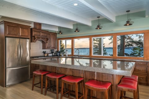 Large kitchen with a beautiful view.
