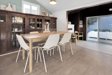 Dining area. Dining table can be rotated and extended to seat 10.