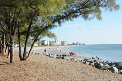 On the beach, sun loungers, beach towels