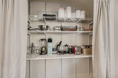 Well stocked pantry including a nice selection of tea and coffee.