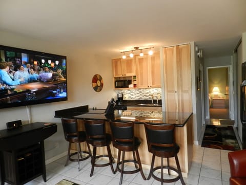 JACKPOT! You just found the best unit. Custom remodel and a HDTV on Steroids!