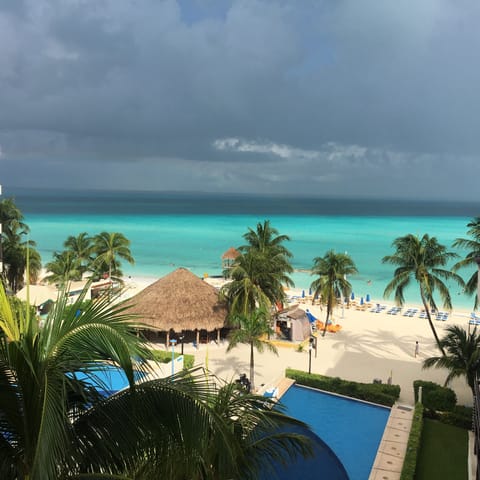 On the beach, sun loungers, beach towels