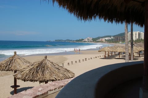 On the beach, sun loungers, beach towels