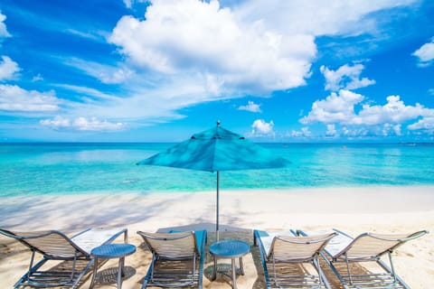 On the beach, sun loungers, beach towels