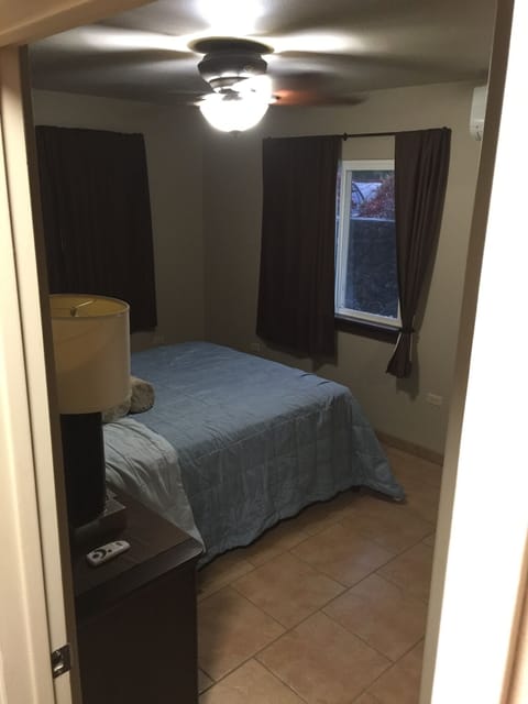 Bedroom 1- Queen size Bed, AC Unit, Ceiling Fan