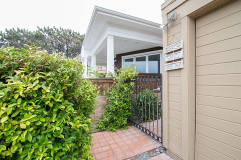 the side entrance from the main house leads back to the unit 