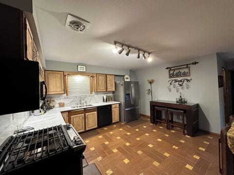 Enjoy cooking and visiting in our open kitchen