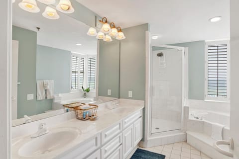 Separate tub and shower, jetted tub, hair dryer, towels