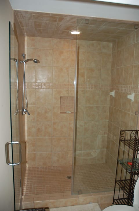 Combined shower/tub, hair dryer, towels, toilet paper