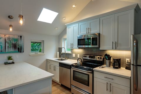 Sky-light over the center of the kitchen. The cottage gets a nice cross breeze.
