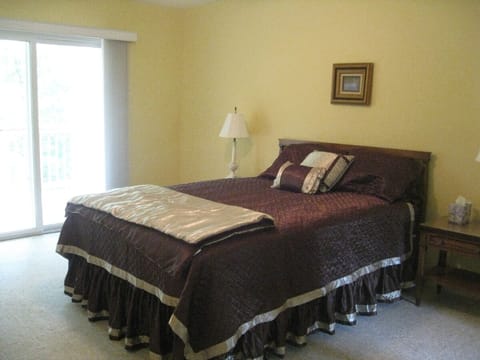Master suite with attached bathroom with shower and jacuzzi tub