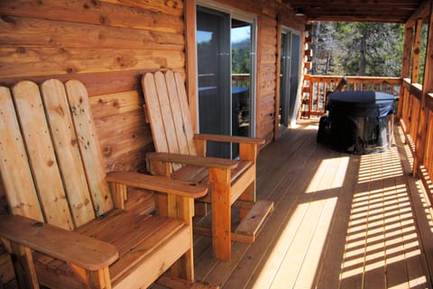 Deck with deck furniture and hot tub for two