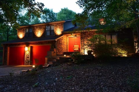 The front of The Zen Retreat...at night...there is landscape lighting surrounding the house.