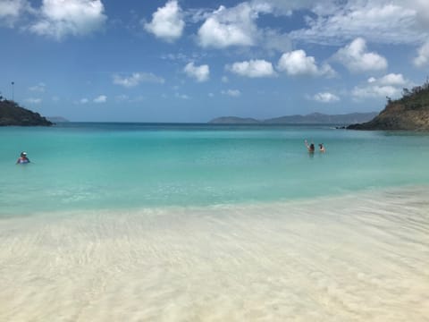 On the beach, sun loungers, beach towels