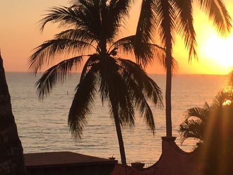 On the beach, sun loungers, beach towels