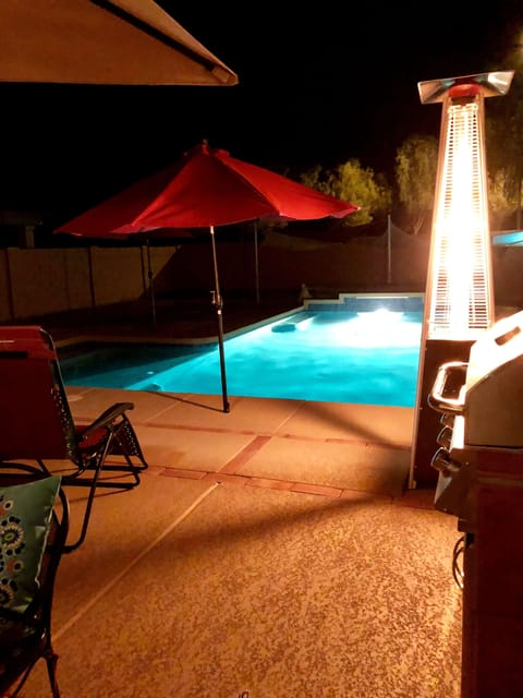Lovely saltwater pool at night with the gas flame heater.