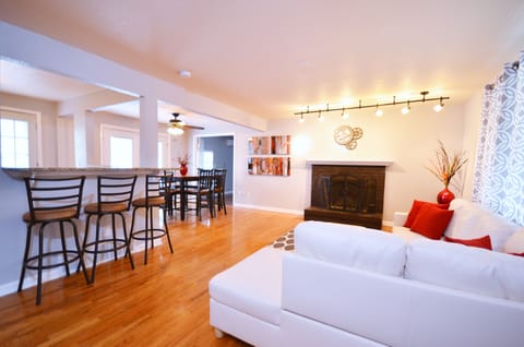 Living room with new furnishings: artwork, furniture, lights, etc.