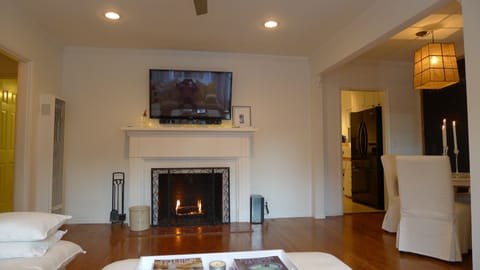 Enjoy Fire place (fire wood provided) while enjoying fully stocked Direct Tv
